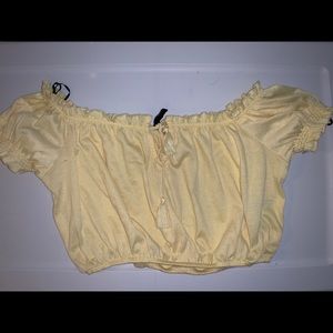 A yellow crop top